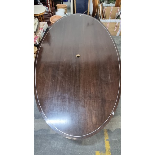 754 - A magnificent, huge oval  Rosewood conference table with substantial metal legs and striking chrome ... 