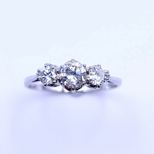 748 - Star lot : A beautiful 18ct white gold vintage ring With three very bright huge sparkle Diamonds. Th... 