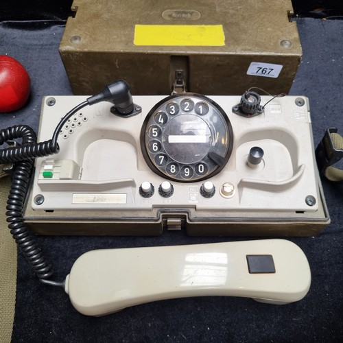 767 - A vintage German Military field phone with DDR radio with green protective case marked ''Bund'' mean... 