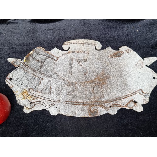 752 - A heavy cast metal wall mounting plaque for Chivas Regal showing the drinks emblem.