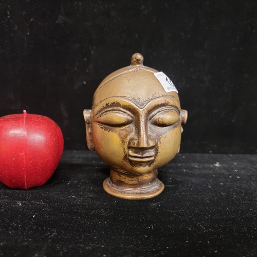 106 - A heavy, bronze 19th century Gauri head. Gauri is the manifestation of Goddess Parvati and symbolic ... 