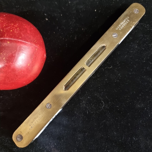 120 - A beautiful example of a brass and walnut spirit level. Stamped with maker ''I.Sorley Sheffield''. C... 