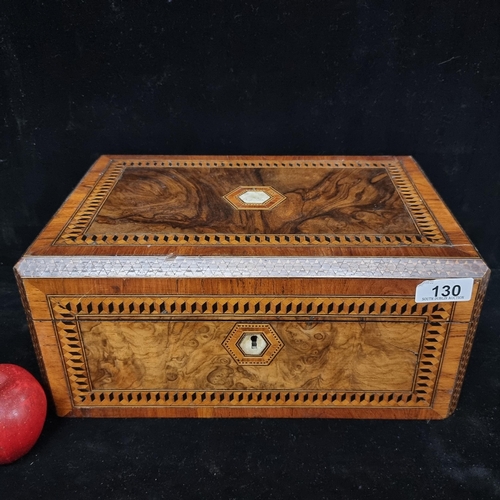 130 - A beautiful Edwardian, mahogany writing slope with burl walnut inlay and decorated with geometric bo... 