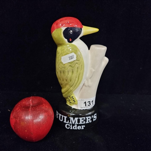 131 - A ceramic Bulmer's advertising figure in the form of the iconic Woodpecker for Bulmer's Woodpecker C... 