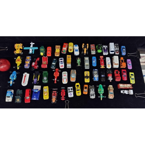 133 - A box containing approximately sixty model cars including Matchbox and Majorette. Models range mostl... 