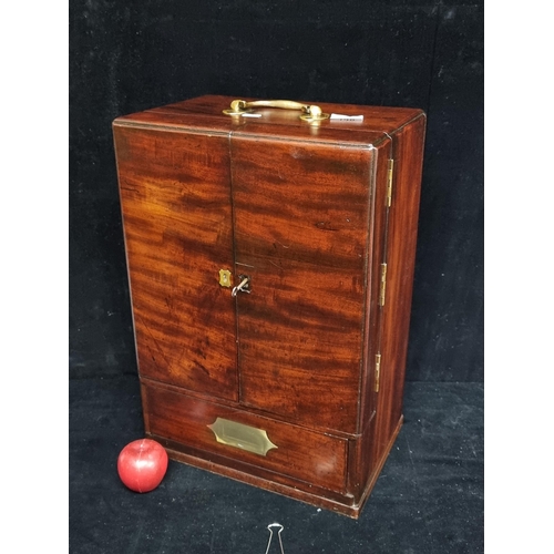 148 - Star Lot: An extremely handsome example of a mahogany Georgian apothecary box. Complete with numerou... 