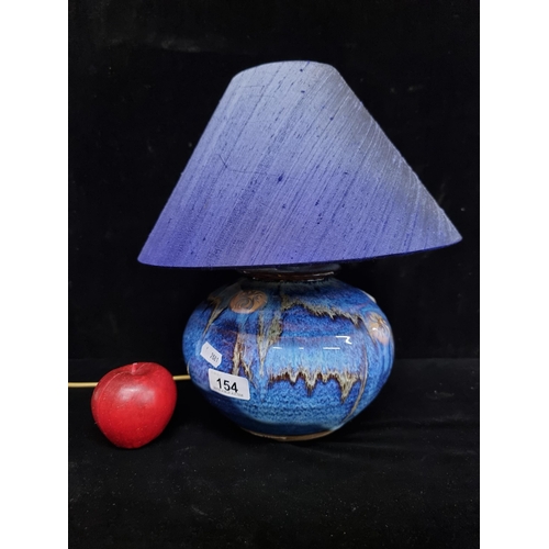 154 - A beautiful hand crafted Irish lamp, with a ceramic base by Colum De Rís Irish Pottery. Featuring th... 