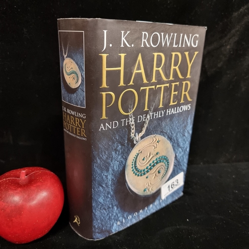 163 - A hard back first edition copy of Harry Potter and the Deathly Hollows by J.K. Rowling, published by... 