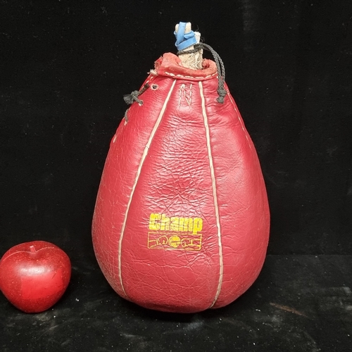 251 - A genuine vintage leather speed bag by Champ.