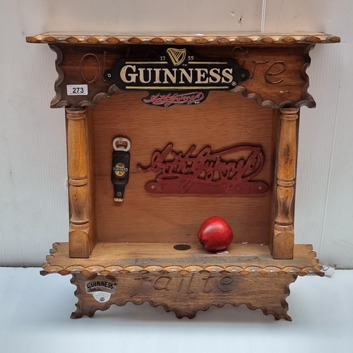 273 - A charming carved wood, wall mounting bar station. With Guinness branding and bar openers etc. With ... 