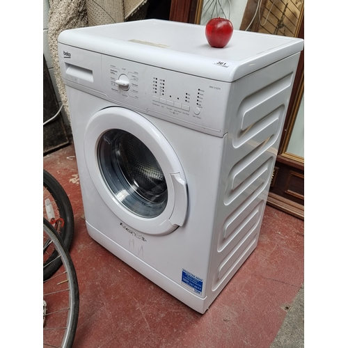 361 - A Beko washing machine model number WM5102W. In good clean condition. 5Kg, 1000 Rpm and A+ energy ra... 