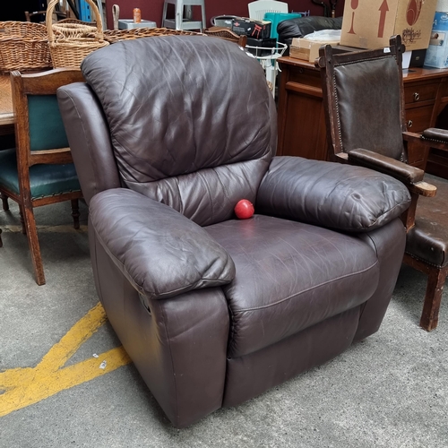 372 - A large genuine leather arm chair. Mm: 94cm x 100cm x 75cm. Extremely comfortable. In very good cond... 