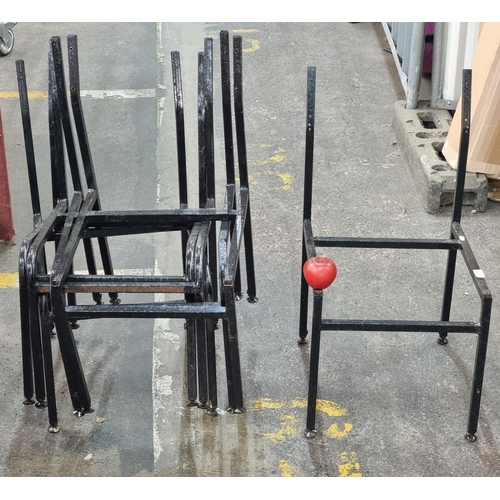 377 - A collection of 6 cast metal chair frames in black.