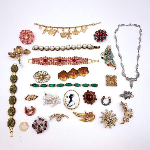 765 - A stunning collection of costume jewellery including 18 brooches of various shapes and sizes, 6 char... 