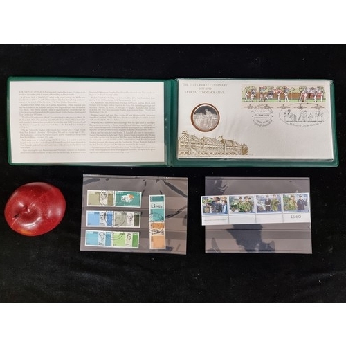 197 - The Test Cricket Centenary 1877-1977 Official Commemorative coin in presentation album, along with a... 