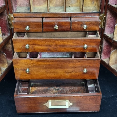 148 - Star Lot: An extremely handsome example of a mahogany Georgian apothecary box. Complete with numerou... 