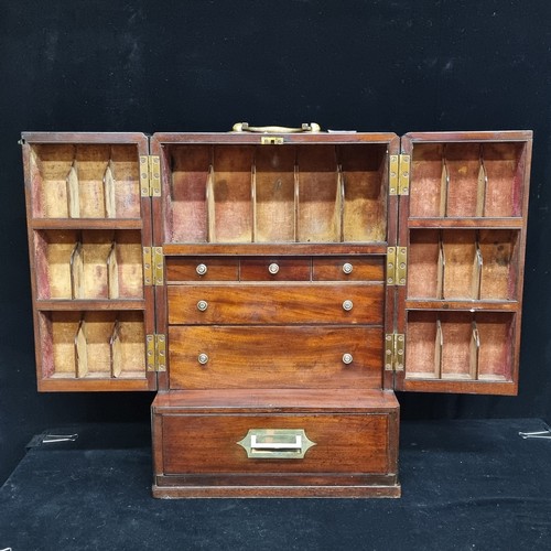 148 - Star Lot: An extremely handsome example of a mahogany Georgian apothecary box. Complete with numerou... 