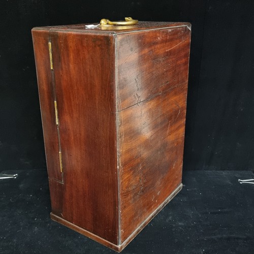 148 - Star Lot: An extremely handsome example of a mahogany Georgian apothecary box. Complete with numerou... 