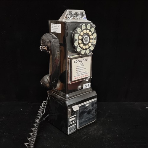 189 - A super retro style Wild & Wolf rotary payphone; great looking piece, in very good condition. There ... 