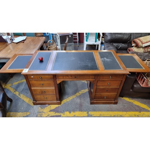 346 - Star Lot - A very handsome Pedestal Desk with a tooled black leather inlay and a number of large dra... 