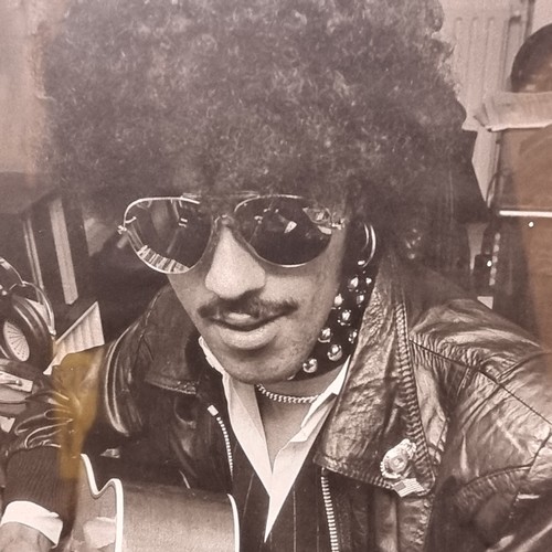 71 - Star Lot: A fantastic iconic original 1976 photograph of Phil Lynott titled 