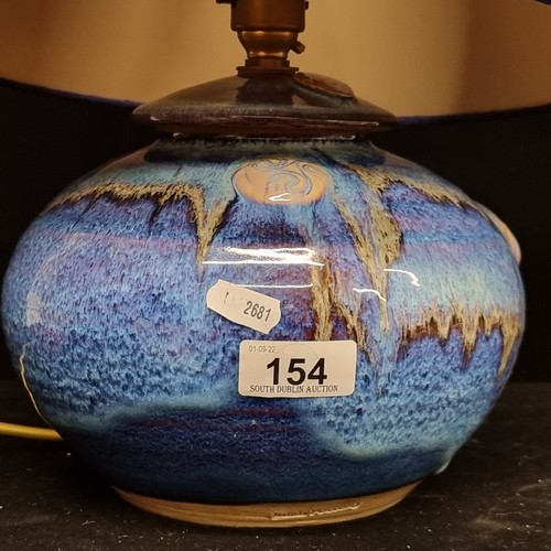 154 - A beautiful hand crafted Irish lamp, with a ceramic base by Colum De Rís Irish Pottery. Featuring th... 