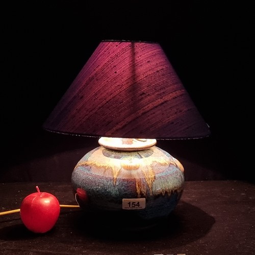 154 - A beautiful hand crafted Irish lamp, with a ceramic base by Colum De Rís Irish Pottery. Featuring th... 