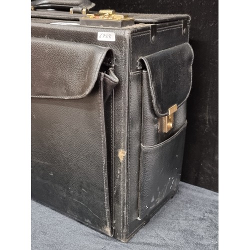 233 - A very nice heavy leather doctors case with combination locks, and space for medical implements. Key... 