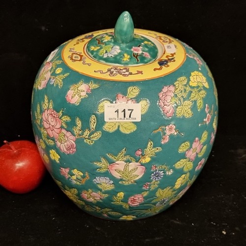 653 - A beautiful large ceramic ginger jar with hand painted floral detailing, scroll border and a vibrant... 