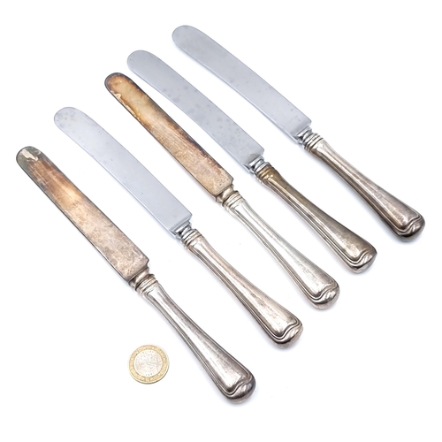 39 - Five sterling silver handled vintage dinner knives. Each with monogram to handle.