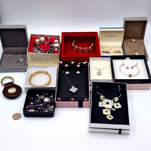 48 - A good collection of designer costume jewellery, consisting of a necklace and earring set. Together ... 
