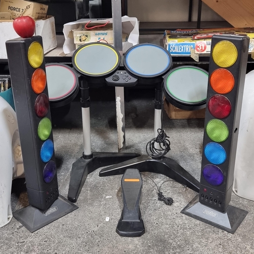 495 - Popstarz childs electric drum kit by Sony and two tower disco lights.