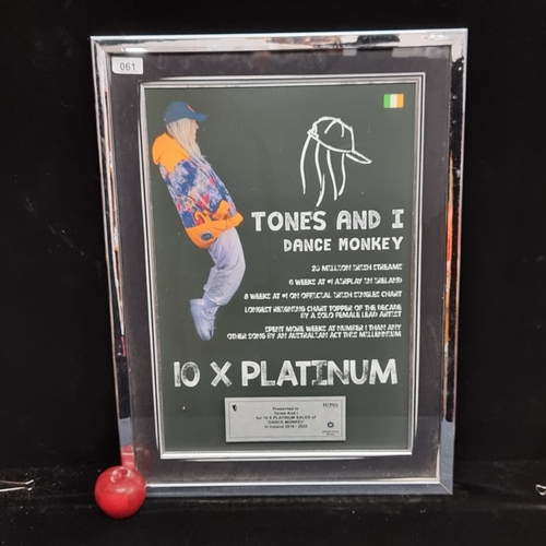 61 - A large framed poster for Tones and I's single 'Dance Monkey' presented by the IRMA for 10 platinum ... 