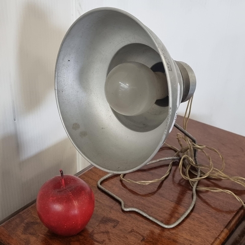 697 - A vintage industrial Photax lamp with metal shade.