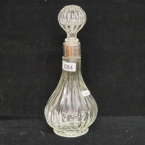 84 - A lovely vintage, cut glass decanter with oversized stopper and silver collar (unmarked). In good co... 