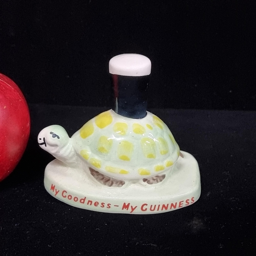 91 - A charming Carlton Ware hand painted, ceramic Guinness tortoise figure, balancing a pint of Ginness ... 