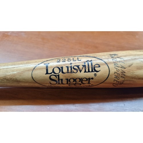 407 - A Louisville Slugger baseball bat with a Darryl Strawberry engraved signature. Handy to keep under t... 