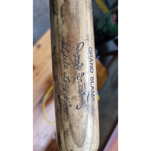 407 - A Louisville Slugger baseball bat with a Darryl Strawberry engraved signature. Handy to keep under t... 