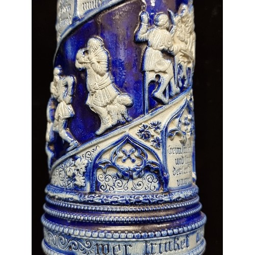 116 - A pair of tall ceramic, stoneware vases. Featuring a cobalt blue glaze and relief detail throughout.... 