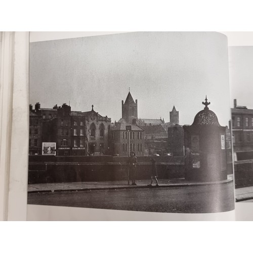 146 - A first edition copy of the book ''Dublin - The People's City. The Photographs of Nevill Johnson (19... 