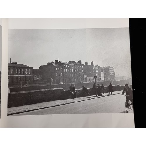 146 - A first edition copy of the book ''Dublin - The People's City. The Photographs of Nevill Johnson (19... 