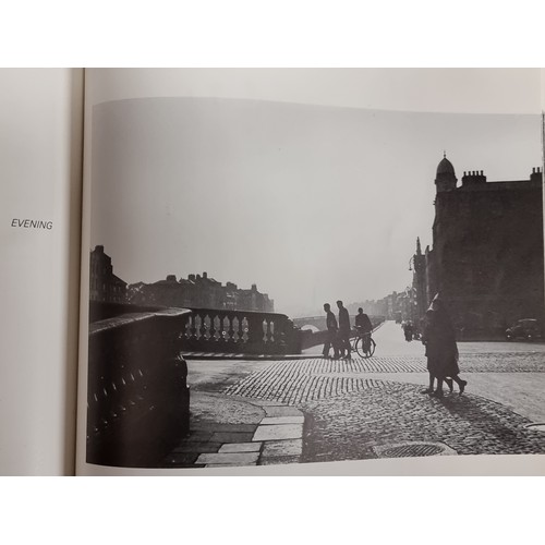 146 - A first edition copy of the book ''Dublin - The People's City. The Photographs of Nevill Johnson (19... 