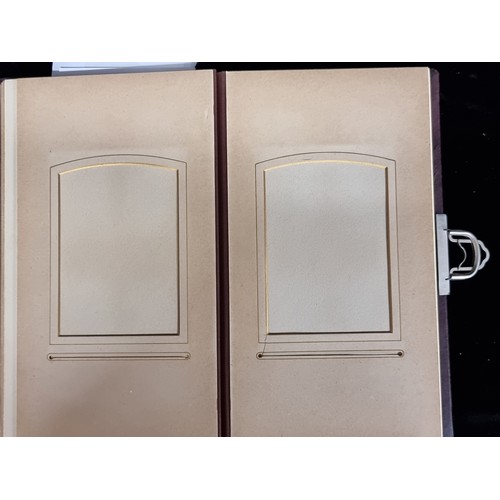 198 - A beautiful antique leather bound photo album with gilt edge, embossed front and chrome clasp. The b... 