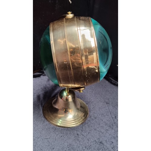 83 - Two items, including an interesting example of a maritime double lensed, magnified clock and compass... 