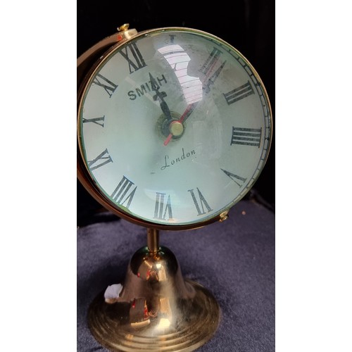 83 - Two items, including an interesting example of a maritime double lensed, magnified clock and compass... 