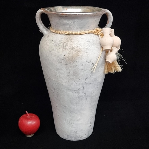 177 - A very large ceramic amphora style pot with rope tie neck. 60cm tall