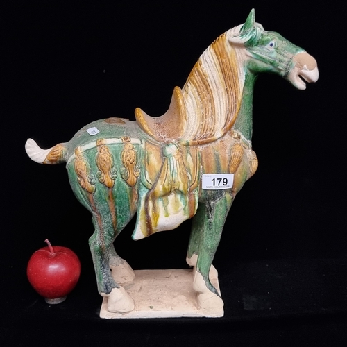 179 - A beautiful Chinese ceramic horse modelled after the Tang dynasty examples and glazed in the customa... 