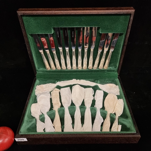 200 - A 43 piece Newbridge Kingspattern canteen of cutlery housed in a green felt lined presentation box. ... 