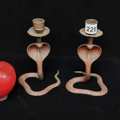 226 - A pair of beautiful brass and enamel taper candle holders with beautiful serpentine cobra bases with... 