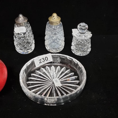 230 - A selection of four Waterford Crystal items including a pair of salt and pepper shakers and a small ... 